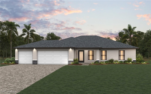 228 NW 22nd Ave, Cape Coral, FL 33993 - view of front of property featuring driveway, roof with shingles, stucco siding, an attached garage, and a lawn
