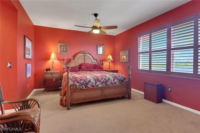 16580 Goldenrod Ln Unit 103, Alva, FL 33920 - carpeted bedroom with baseboards and ceiling fan