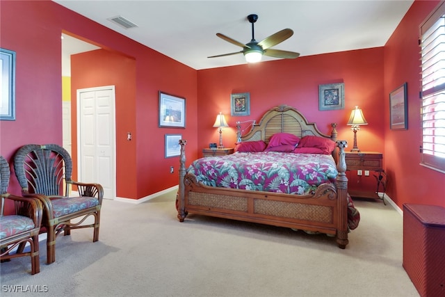 16580 Goldenrod Ln Unit 103, Alva, FL 33920 - bedroom featuring baseboards, visible vents, carpet floors, and a ceiling fan