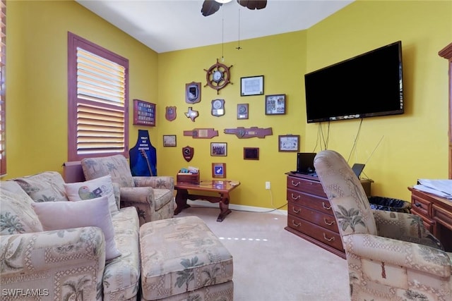 16580 Goldenrod Ln Unit 103, Alva, FL 33920 - carpeted living room with baseboards and ceiling fan