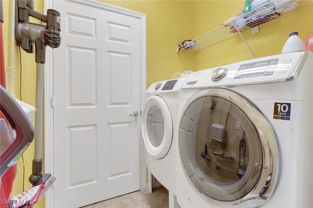 16580 Goldenrod Ln Unit 103, Alva, FL 33920 - laundry area with laundry area and washer and clothes dryer