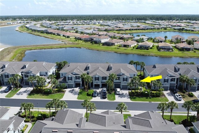 16580 Goldenrod Ln Unit 103, Alva, FL 33920 - drone / aerial view featuring a residential view and a water view