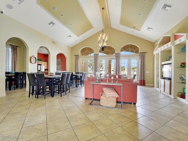 11735 Eros Rd, Lehigh Acres, FL 33971 - living room with light tile patterned flooring, beam ceiling, and visible vents