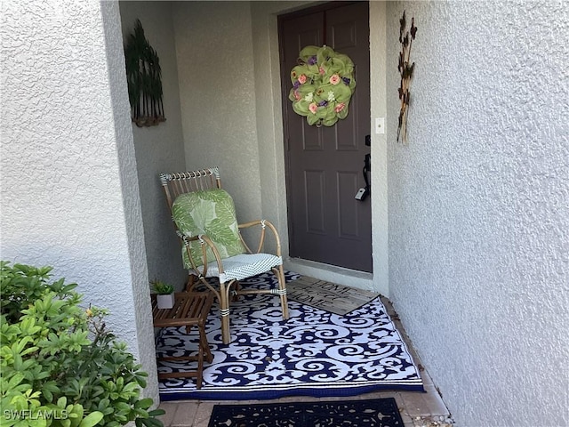 11735 Eros Rd, Lehigh Acres, FL 33971 - entrance to property featuring stucco siding