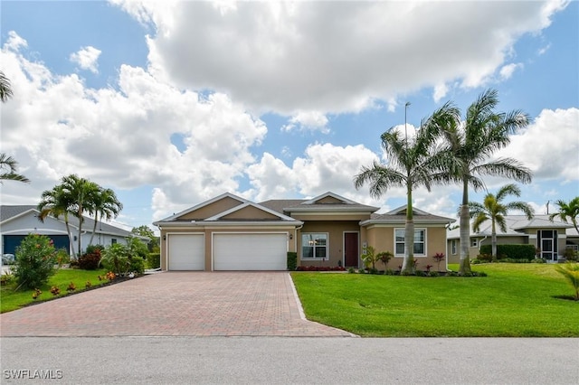 1410 SW 38th St, Cape Coral, FL 33914 - single story home featuring decorative driveway, stucco siding, an attached garage, and a front lawn