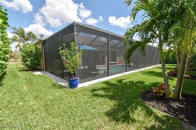 1410 SW 38th St, Cape Coral, FL 33914 - back of house with a lawn, an outdoor pool, glass enclosure, and a patio area