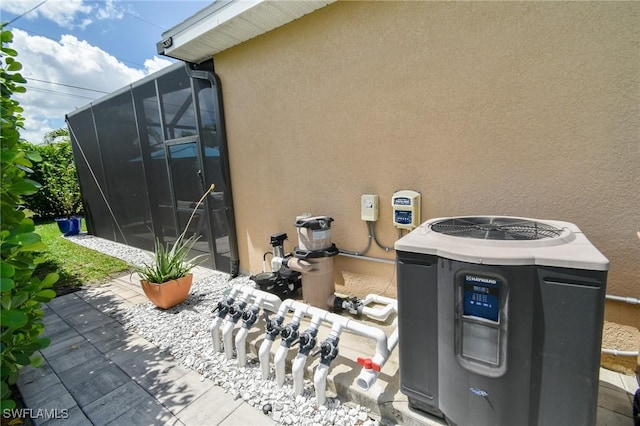 1410 SW 38th St, Cape Coral, FL 33914 - exterior view of stucco siding and cooling unit