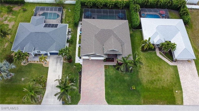 1410 SW 38th St, Cape Coral, FL 33914 - view from above of property with a pool area