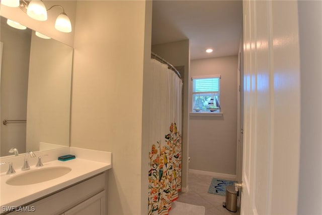 1410 SW 38th St, Cape Coral, FL 33914 - bathroom with tile patterned floors, vanity, and recessed lighting