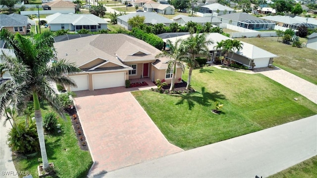 1410 SW 38th St, Cape Coral, FL 33914 - aerial perspective of suburban area
