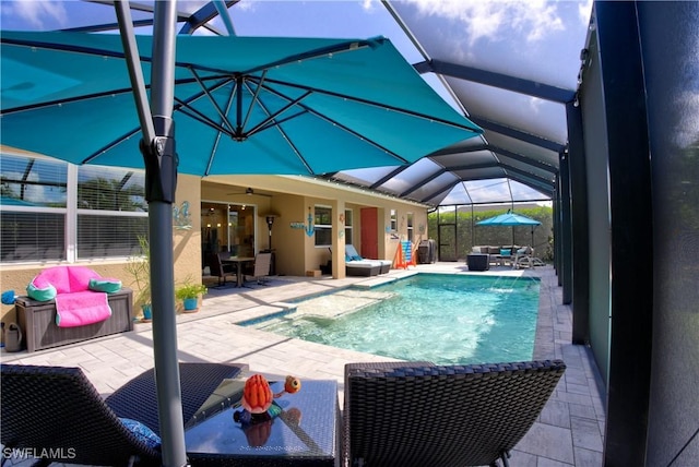 1410 SW 38th St, Cape Coral, FL 33914 - outdoor pool featuring a patio, glass enclosure, and ceiling fan