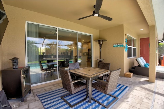 1410 SW 38th St, Cape Coral, FL 33914 - view of patio / terrace with a ceiling fan and outdoor dining area