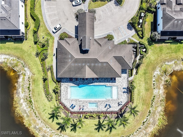 bird's eye view with a water view