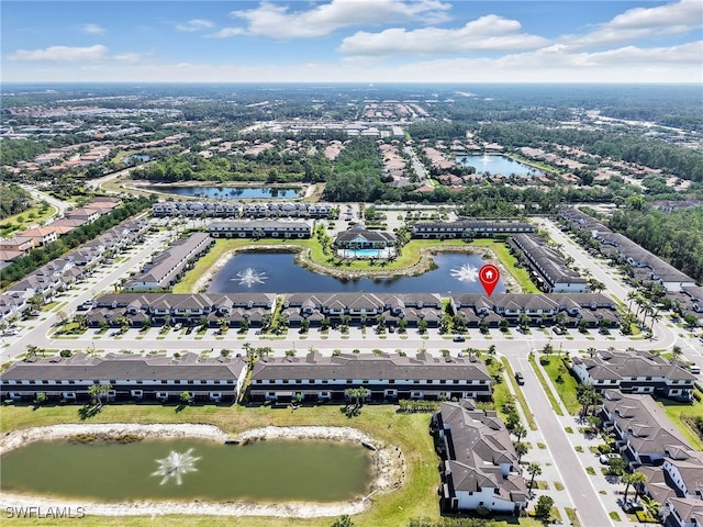aerial view featuring a water view and a residential view