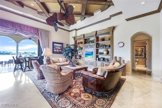 580 S Heathwood Dr, Marco Island, FL 34145 - living room with coffered ceiling, ornamental molding, baseboards, arched walkways, and a ceiling fan