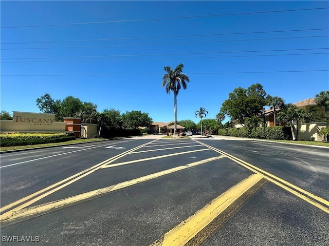 view of street featuring curbs