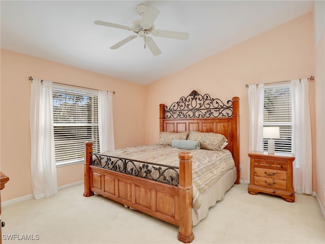 5774 Greenwood Cir Unit 64, Naples, FL 34112 - bedroom featuring light carpet, multiple windows, and lofted ceiling