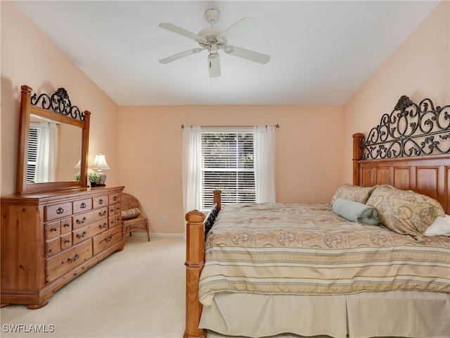 5774 Greenwood Cir Unit 64, Naples, FL 34112 - bedroom featuring baseboards, ceiling fan, and light colored carpet
