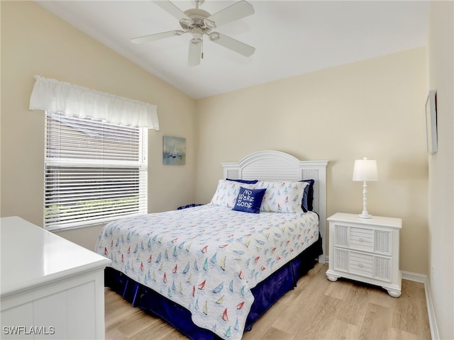 5774 Greenwood Cir Unit 64, Naples, FL 34112 - bedroom with light wood-style flooring, baseboards, lofted ceiling, and ceiling fan