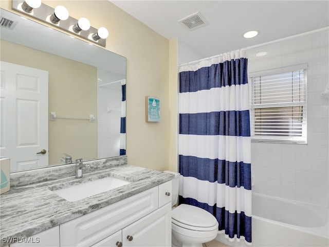 5774 Greenwood Cir Unit 64, Naples, FL 34112 - full bath featuring visible vents, toilet, vanity, and shower / bath combo
