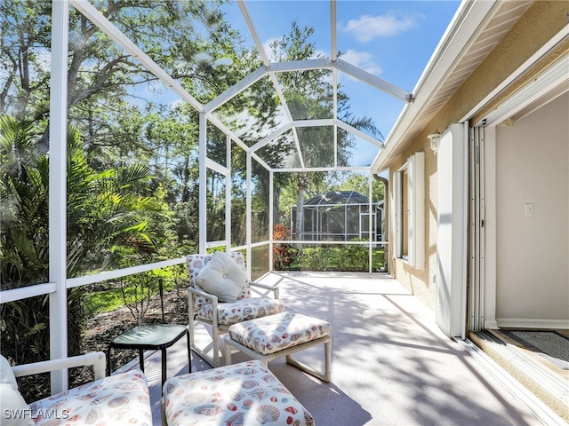 5774 Greenwood Cir Unit 64, Naples, FL 34112 - unfurnished sunroom with a wealth of natural light