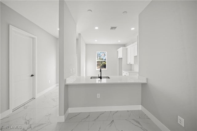 1034 Green Field St, Lehigh Acres, FL 33974 - bathroom featuring a sink, baseboards, marble finish flooring, and recessed lighting