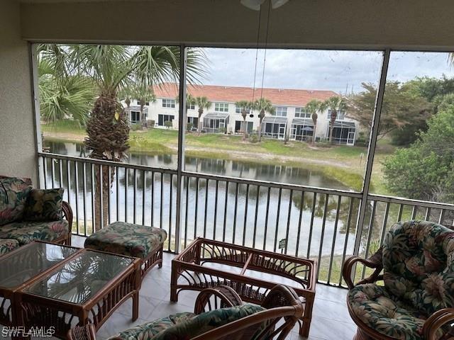 1280 Henley St Unit 1601, Naples, FL 34105 - sunroom / solarium featuring a water view