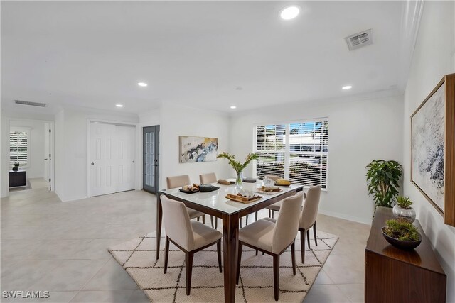 750 Southern Pines Dr, Naples, FL 34103 - dining area with light tile patterned floors, recessed lighting, ornamental molding, and baseboards