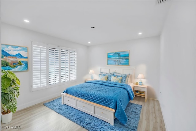 750 Southern Pines Dr, Naples, FL 34103 - bedroom with wood finished floors, baseboards, and recessed lighting