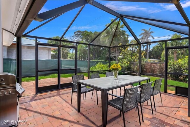 750 Southern Pines Dr, Naples, FL 34103 - sunroom featuring outdoor dining space and lofted ceiling
