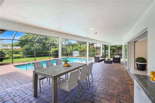 750 Southern Pines Dr, Naples, FL 34103 - sunroom featuring a swimming pool, outdoor lounge area, and outdoor dining area