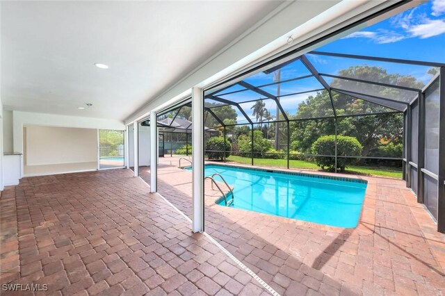 750 Southern Pines Dr, Naples, FL 34103 - outdoor pool featuring a patio and a lanai