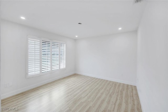 750 Southern Pines Dr, Naples, FL 34103 - empty room featuring wood finished floors, recessed lighting, and baseboards