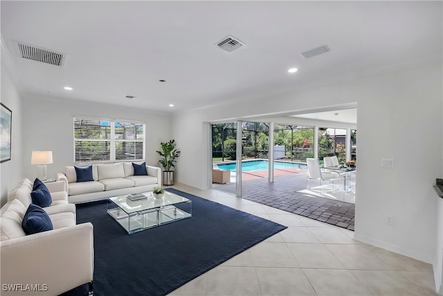 750 Southern Pines Dr, Naples, FL 34103 - living area featuring plenty of natural light, light tile patterned flooring, recessed lighting, and baseboards