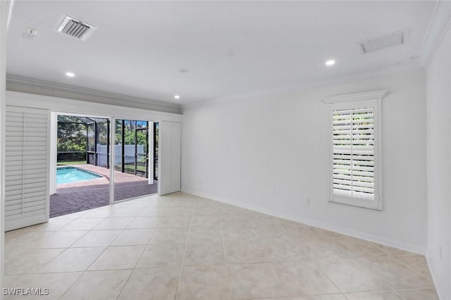 750 Southern Pines Dr, Naples, FL 34103 - unfurnished room featuring crown molding, recessed lighting, baseboards, and light tile patterned floors