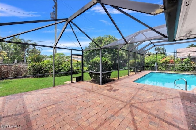 750 Southern Pines Dr, Naples, FL 34103 - swimming pool with a patio area, a lanai, and a lawn