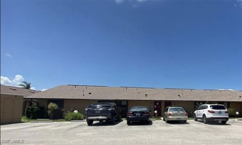view of front of home with uncovered parking