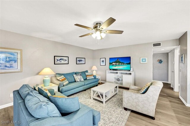 827 E Gulf Dr Unit K8, Sanibel, FL 33957 - living area with baseboards, visible vents, light wood-style floors, and ceiling fan