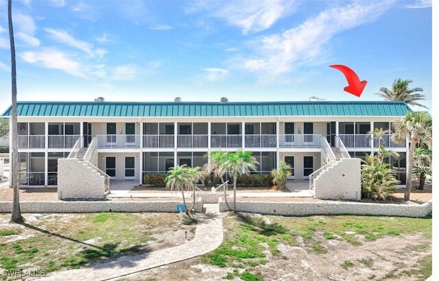 827 E Gulf Dr Unit K8, Sanibel, FL 33957 - view of building exterior with stairs