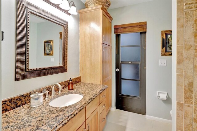 423 SE 17th St, Cape Coral, FL 33990 - bathroom featuring vanity and baseboards