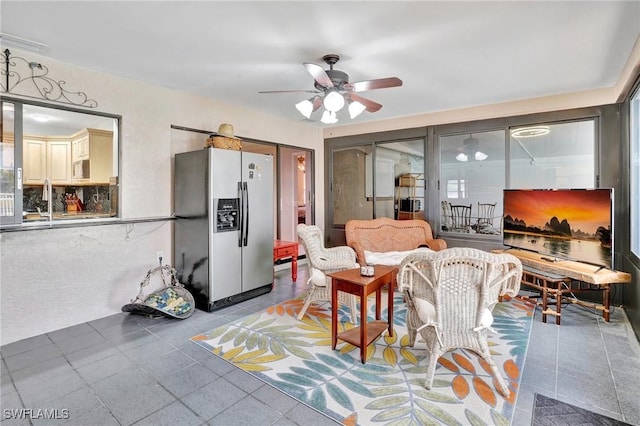 423 SE 17th St, Cape Coral, FL 33990 - living area featuring light tile patterned floors and ceiling fan