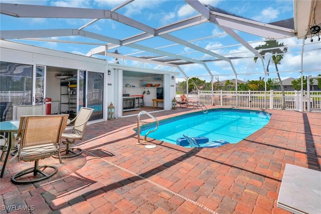 423 SE 17th St, Cape Coral, FL 33990 - outdoor pool with fence, a lanai, and a patio area
