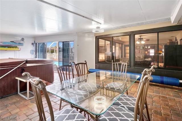 423 SE 17th St, Cape Coral, FL 33990 - dining space with a sunroom and a ceiling fan