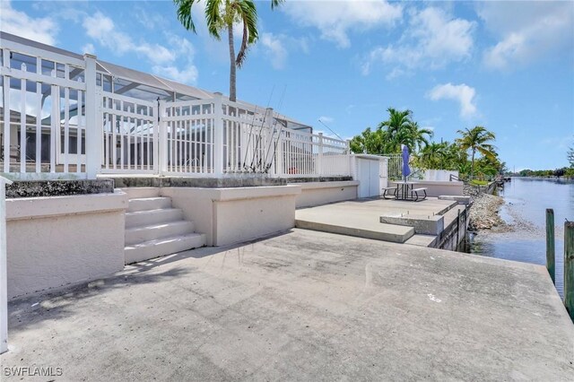 423 SE 17th St, Cape Coral, FL 33990 - view of patio / terrace with a water view