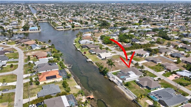 423 SE 17th St, Cape Coral, FL 33990 - drone / aerial view with a residential view and a water view