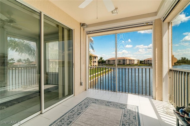 9150 Southmont Cv Unit 203, Fort Myers, FL 33908 - balcony featuring a water view and ceiling fan
