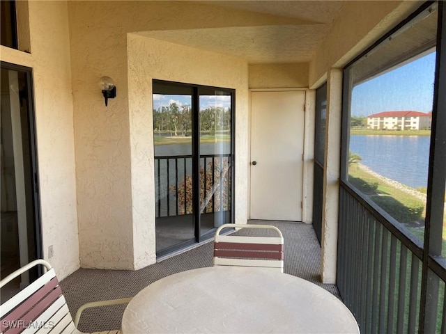 13111 Cross Creek Blvd SE Unit 215, Fort Myers, FL 33912 - sunroom with a water view and healthy amount of natural light