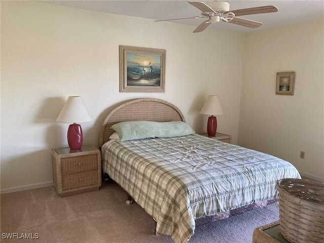 13111 Cross Creek Blvd SE Unit 215, Fort Myers, FL 33912 - bedroom with carpet and a ceiling fan