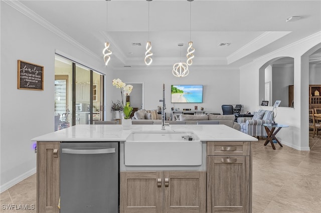 kitchen featuring dishwasher, light stone countertops, arched walkways, a sink, and open floor plan