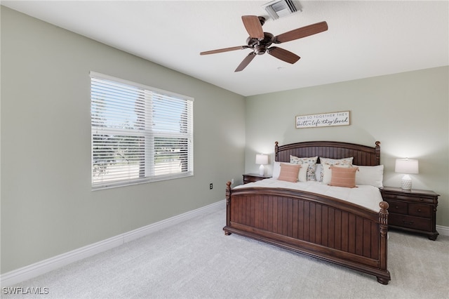 11991 Champions Green Way Unit 608, Fort Myers, FL 33913 - bedroom with light carpet, baseboards, and ceiling fan